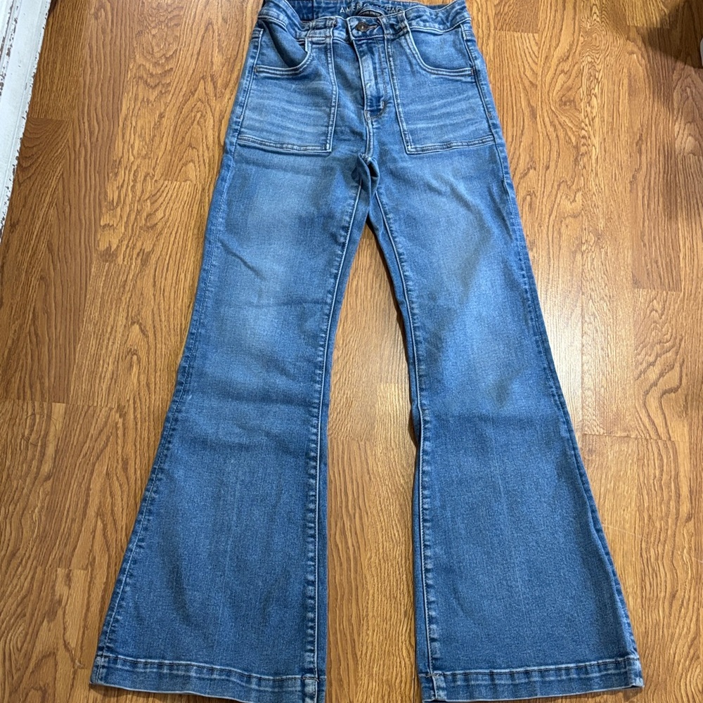 Women's High-Rise Blue Flare Jeans with Front Patch Pockets